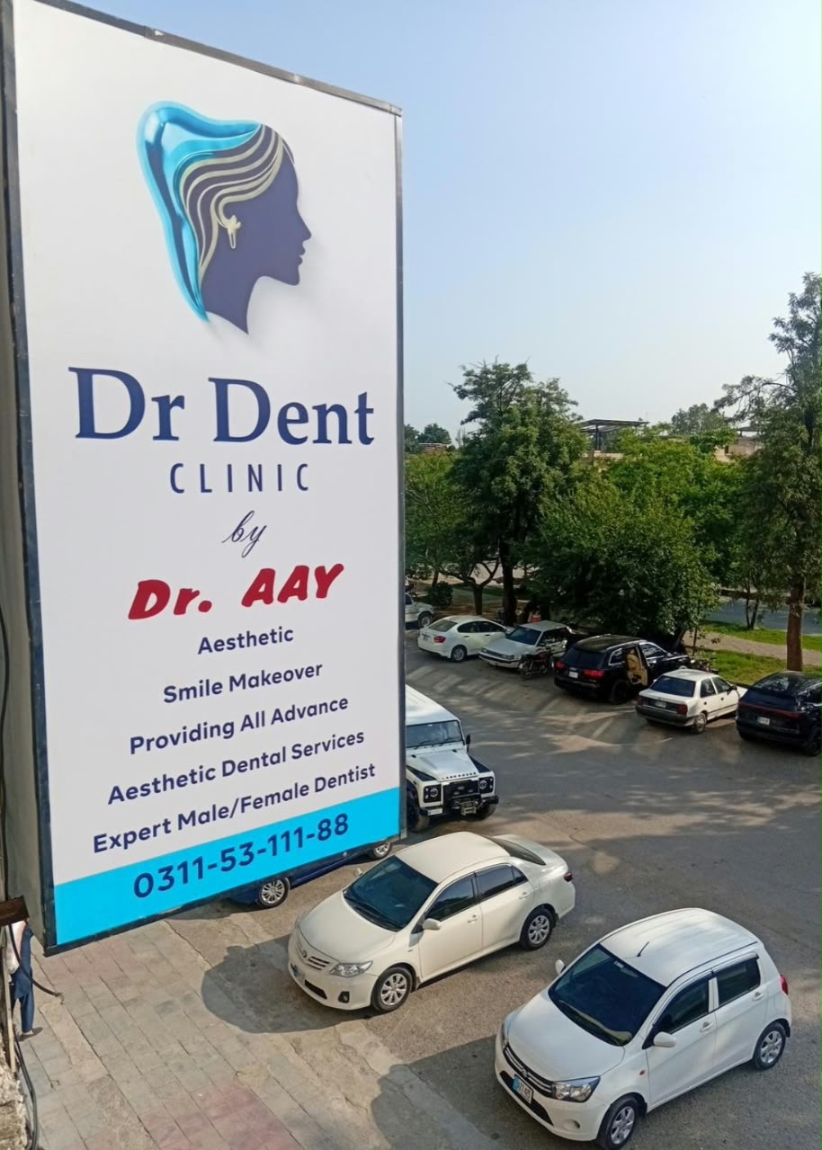 Dr Dent Clinic exterior signage, showing the clinic name and contact number