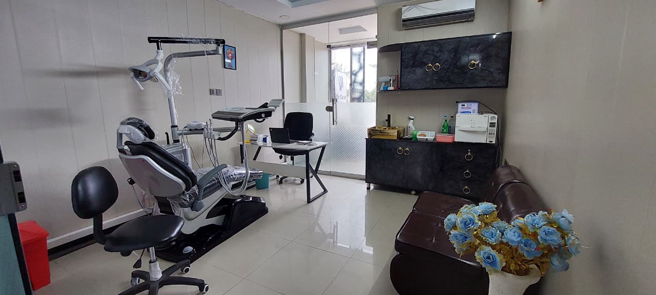 Treatment room inside Dr Dent Clinic, showing the dental chair and equipment